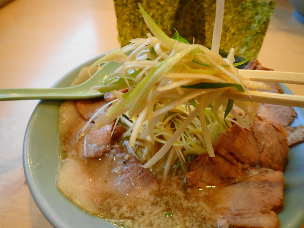 独自の調味料で調味されたネギ